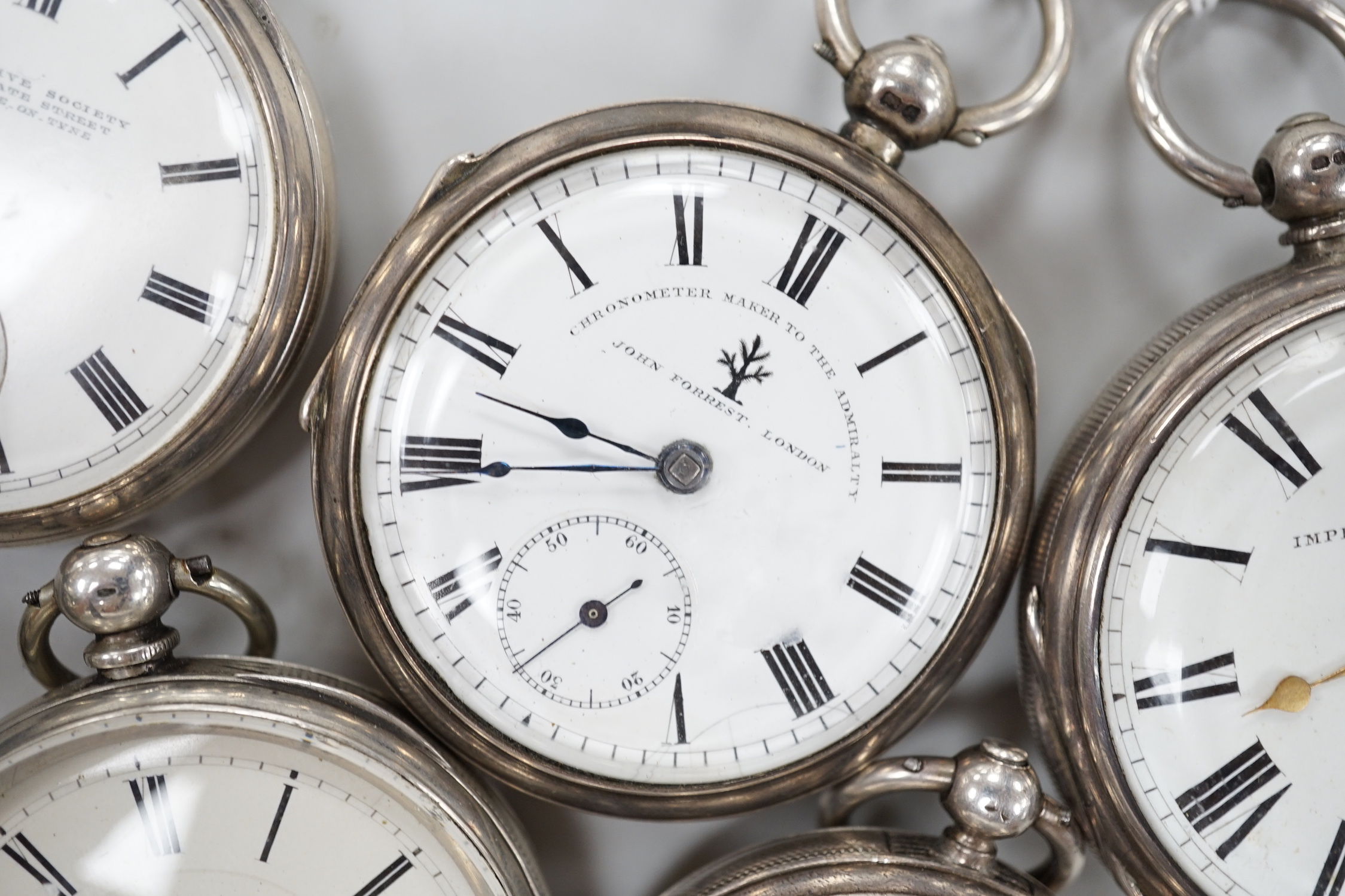 Nine assorted silver or white metal pocket watches including Joseph Stromier and John Forrest.